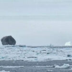 Rare Black Iceberg Spotted in Canada Exceeds Scientists' Curiosity with Its Mysterious Dark Hue |  THE PRIME NEWS NETWORK
