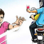 મોબાઈલ વાપરતા યુવકના હાથમાંથી બાઈક સવારે ફોન ઝૂંટવ્યો, ત્રિપુટી ફરાર  

## Mobile Theft Incident in Vadodara: Thief Snatches Phone, Escapes on Bike

A daring theft occurred in Vadodara as a thief snatched a mobile phone from a youth while he was talking on it. The incident, captured on CCTV, shows the thief riding a bike and swiftly grabbing the phone.

### Key Points:

- Location: Vadodara, an area prone to such thefts
- Perpetrator: A bike rider wearing a helmet and mask
- Victim: A youth who was speaking on his mobile phone
- Method: The thief grabbed the phone from the victim's hand
- Escape: The thief fled the scene on a motorbike
- Evidence: The entire incident was recorded on CCTV
- Current Status: The thief is still at large
- Advice: Public advised to be cautious while using mobile phones in public areas

### Additional Details:

The incident took place where another young man was talking on his phone near a shop. The bike rider, wearing a helmet and mask, approached the youth and snatched his Samsung Galaxy A04 mobile phone. The thief then quickly escaped the scene, heightening the need for increased vigilance in such areas.

The police are currently investigating the incident, and efforts are underway to apprehend the thief. They have appealed to the public for any information that might help in locating the culprit. In the meantime, citizens are being warned to be cautious and avoid using their mobile phones in inconvenient and potentially risky locations.

Bike riders are also reminded to wear helmets for safety, and the public is encouraged to remain aware of their surroundings to prevent such crimes.